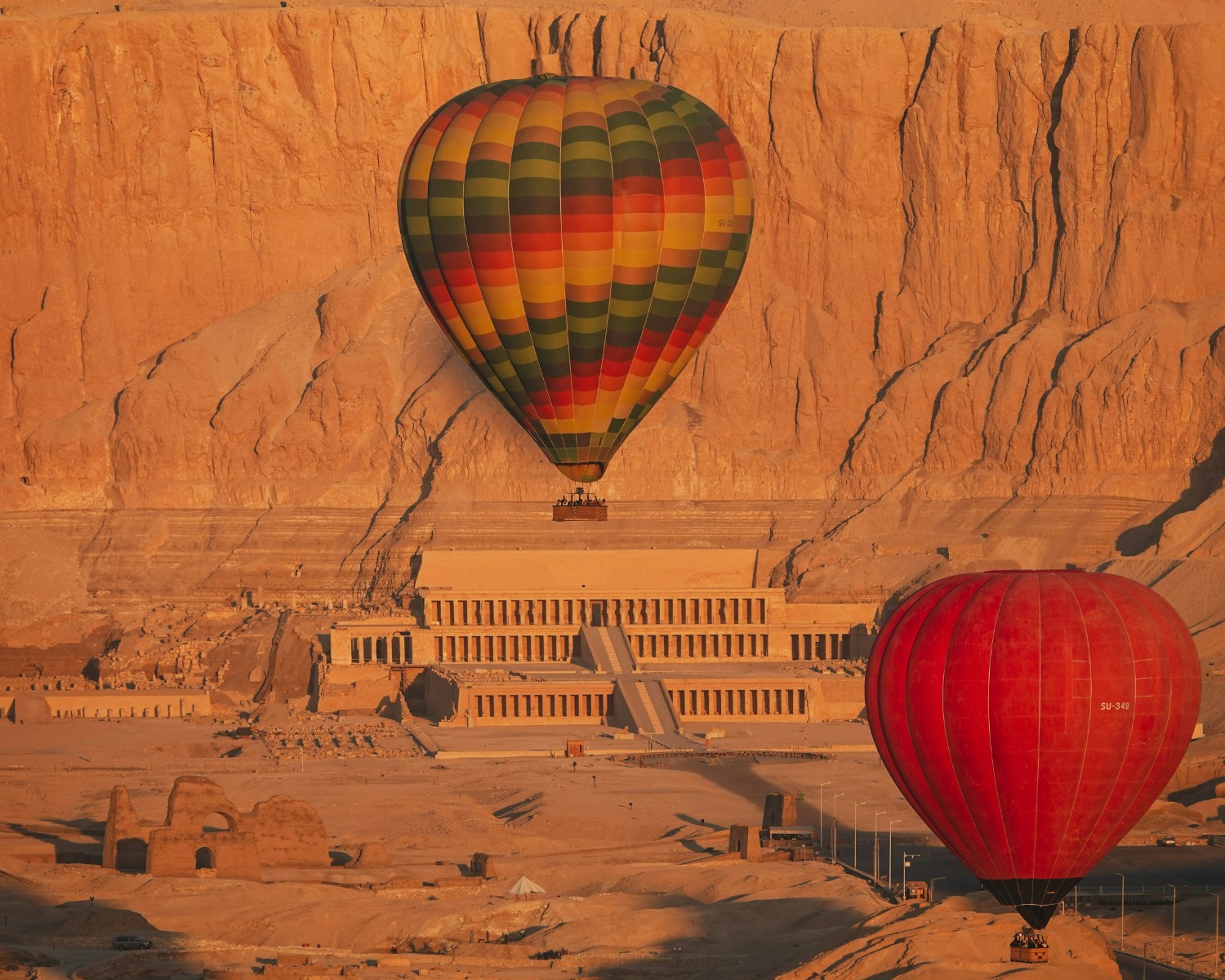 Hot air balloons over Luxor at sunrise