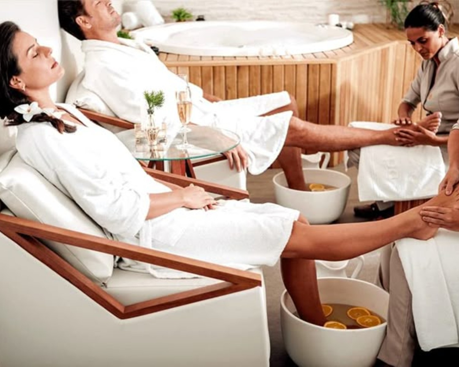 Couples' massage in tropical spa setting